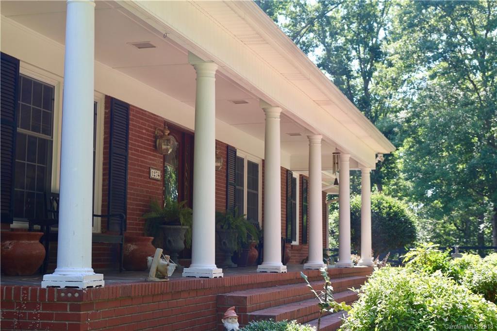 1274 Blacksnake Road Stanley, NC 28164 - Photo 33 of 34 a view of a house with potted plants