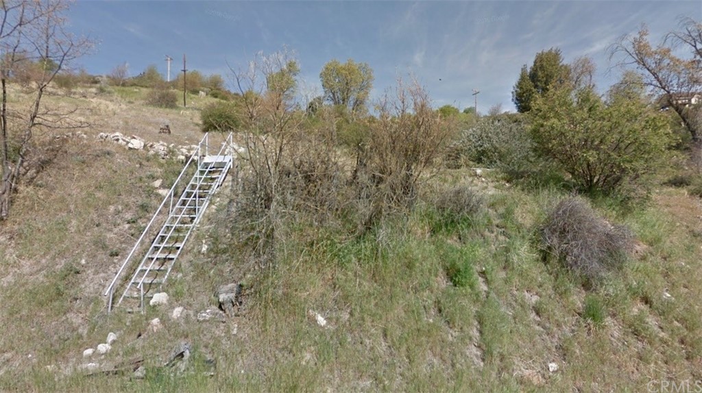 Front St. Lot to the right of stairs