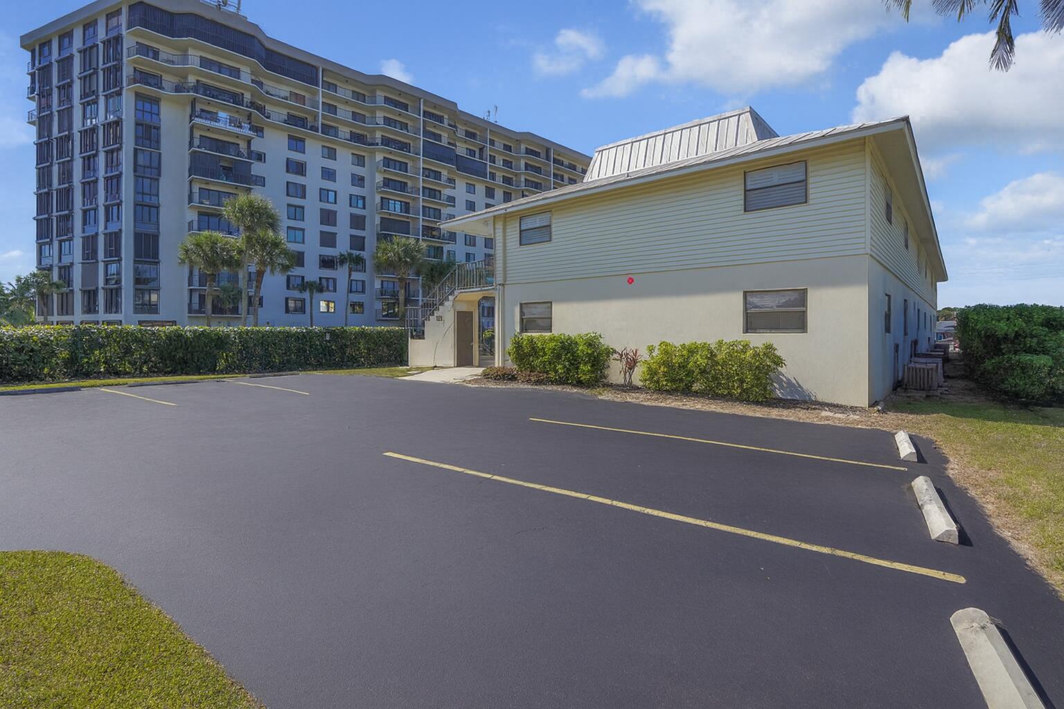 715 South Ocean Drive, Unit G Fort Pierce, FL 34949 - Photo 6 of 24 a brick building with a view of street