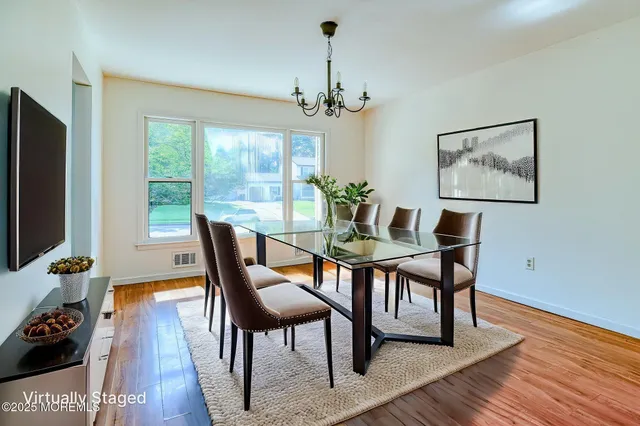 a living room with furniture or couch and a flat screen tv