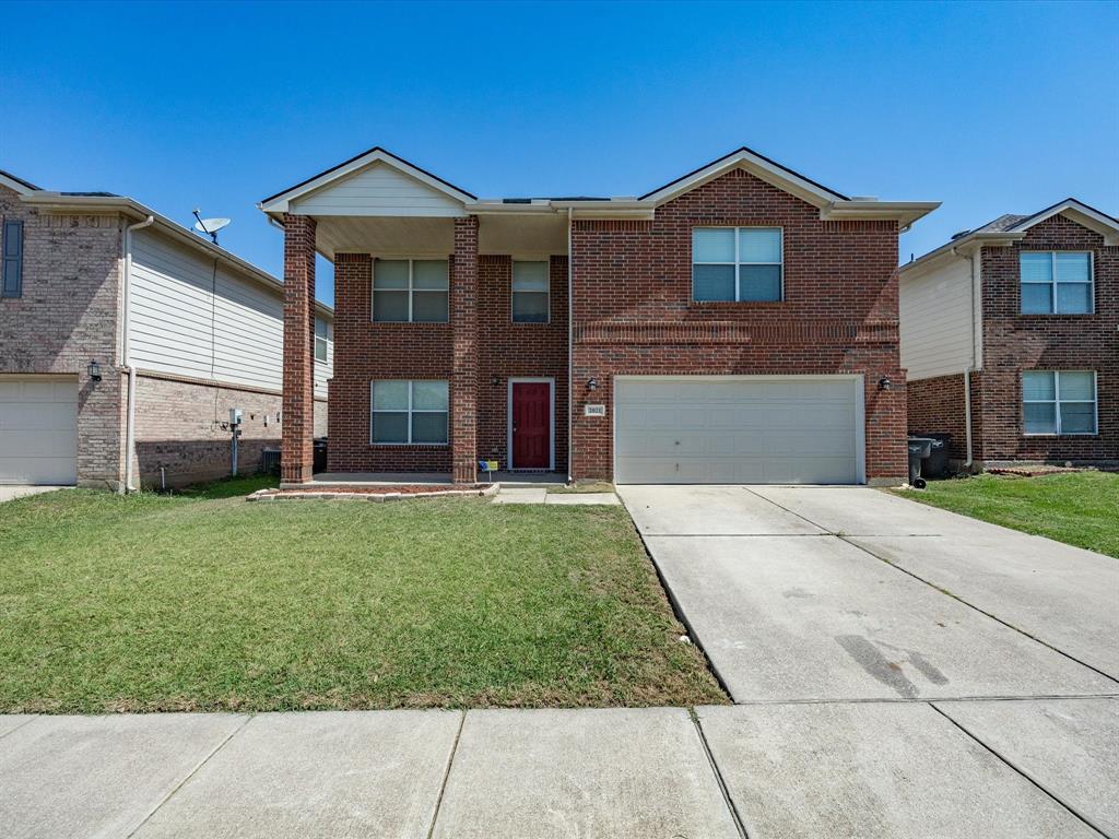 2021 Laughlin Road Fort Worth, TX 76177 - Photo 37 of 40 Two-story brick facade with a columned front porch, a two-car garage, and an extended concrete driveway