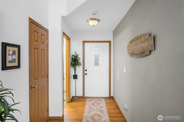 a view of room with window and hardwood