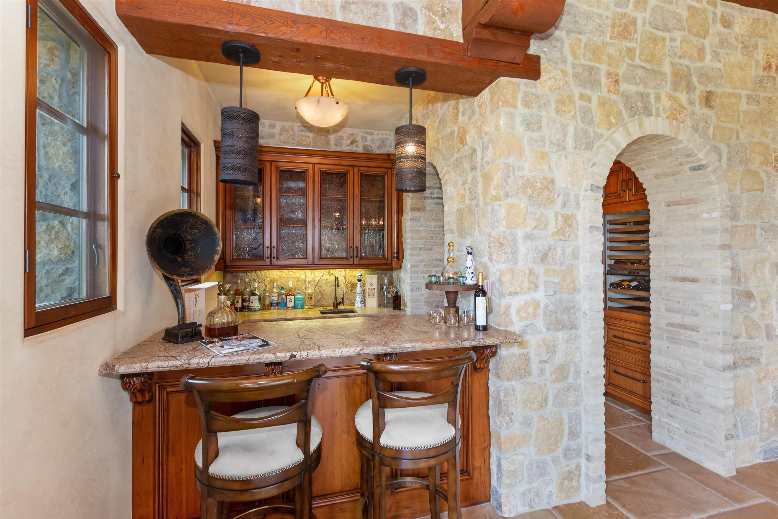6309 Strada Fragante Rancho Santa Fe, CA 92091 - Photo 14 of 49 a view of a dining room with furniture and chandelier