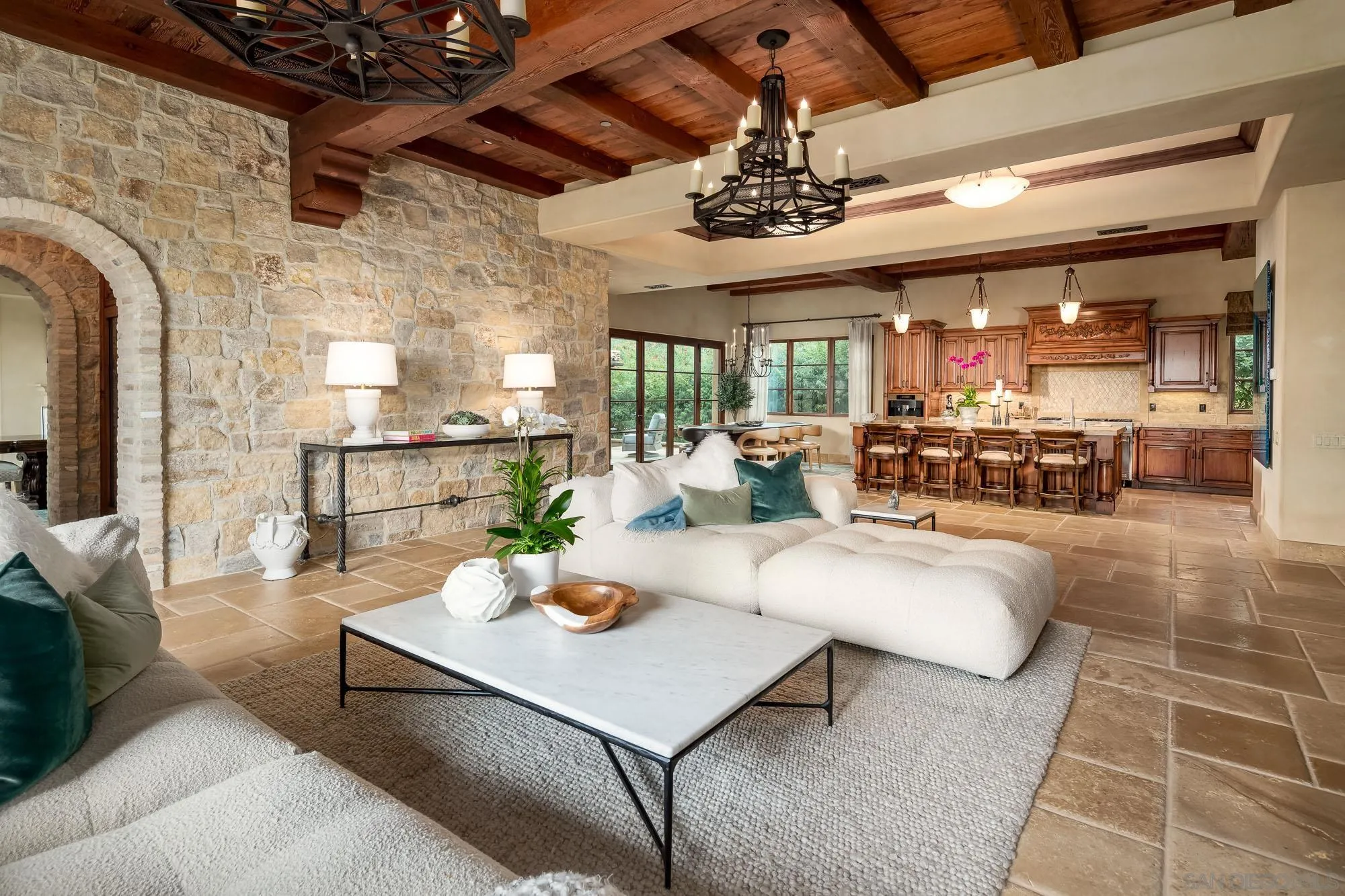 6309 Strada Fragante Rancho Santa Fe, CA 92091 - Photo 15 of 49 a living room with furniture and a chandelier
