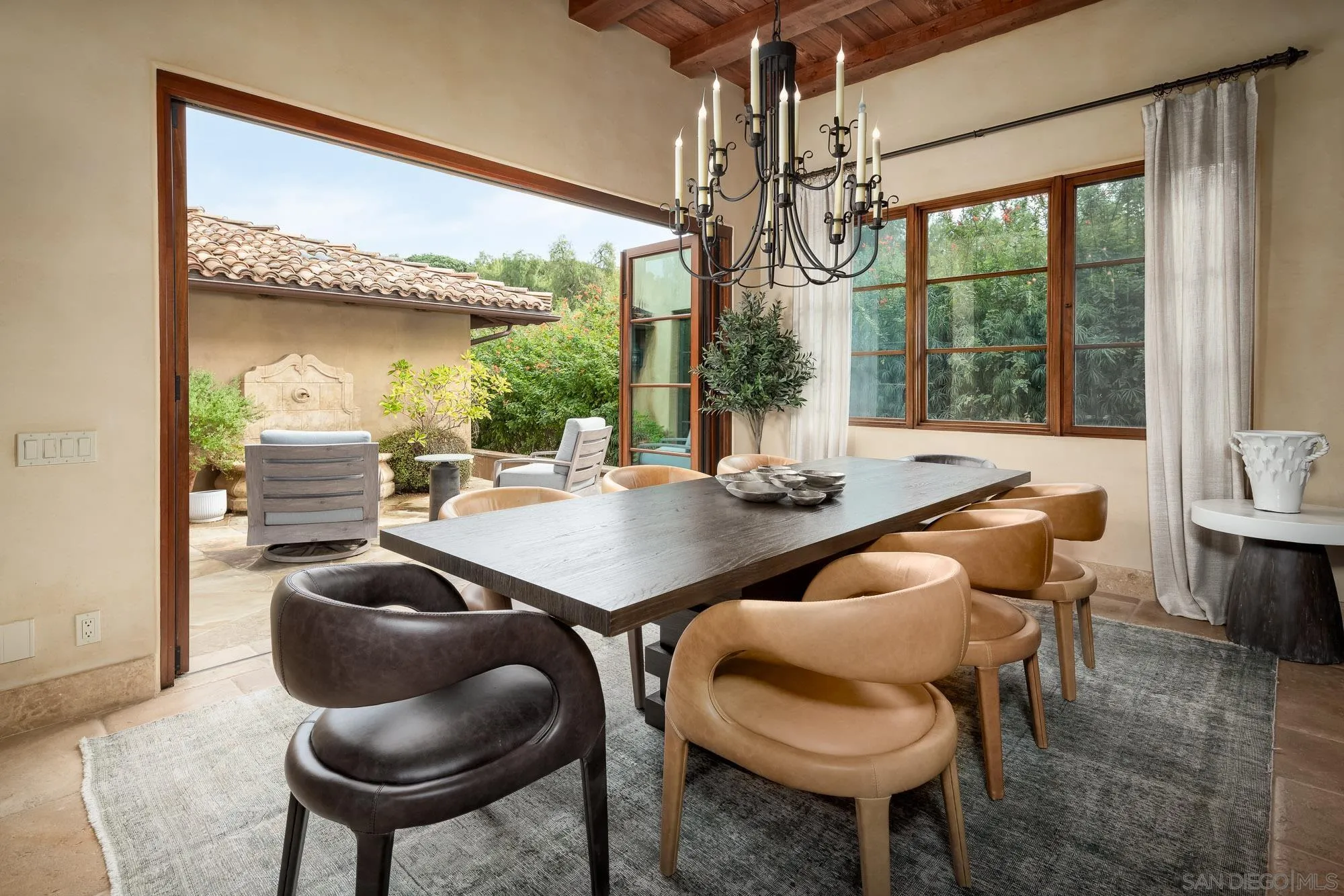6309 Strada Fragante Rancho Santa Fe, CA 92091 - Photo 18 of 49 a dining room with furniture and window