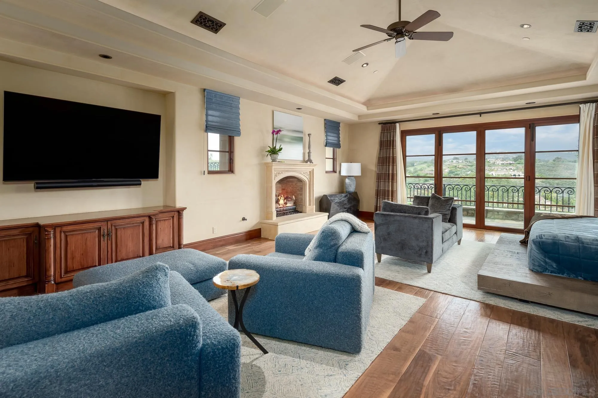 6309 Strada Fragante Rancho Santa Fe, CA 92091 - Photo 22 of 49 a living room with furniture and a flat screen tv