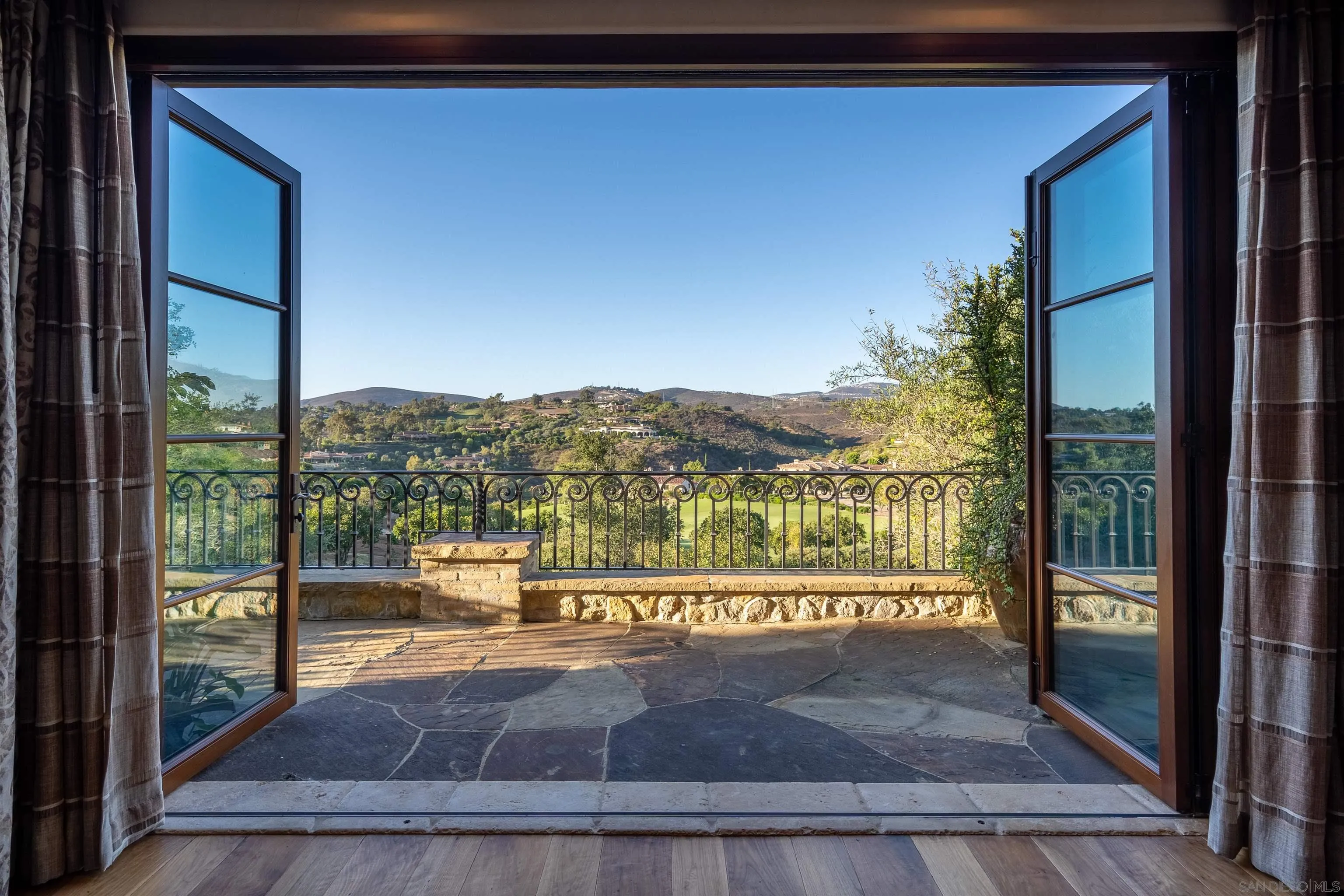 6309 Strada Fragante Rancho Santa Fe, CA 92091 - Photo 24 of 49 a view of a floor to ceiling window with an outdoor view