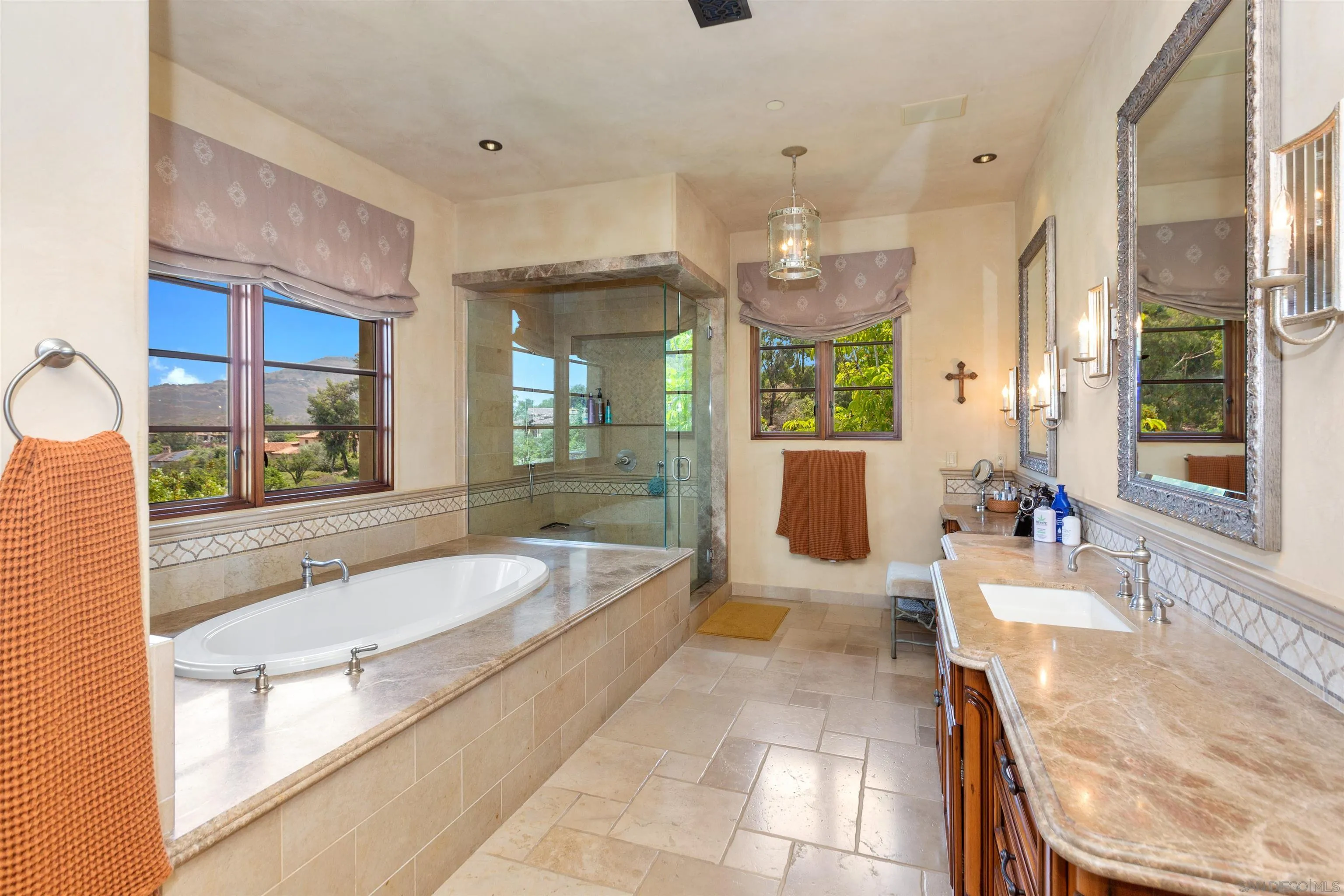 6309 Strada Fragante Rancho Santa Fe, CA 92091 - Photo 25 of 49 a large spacious bathroom with a large tub and sink