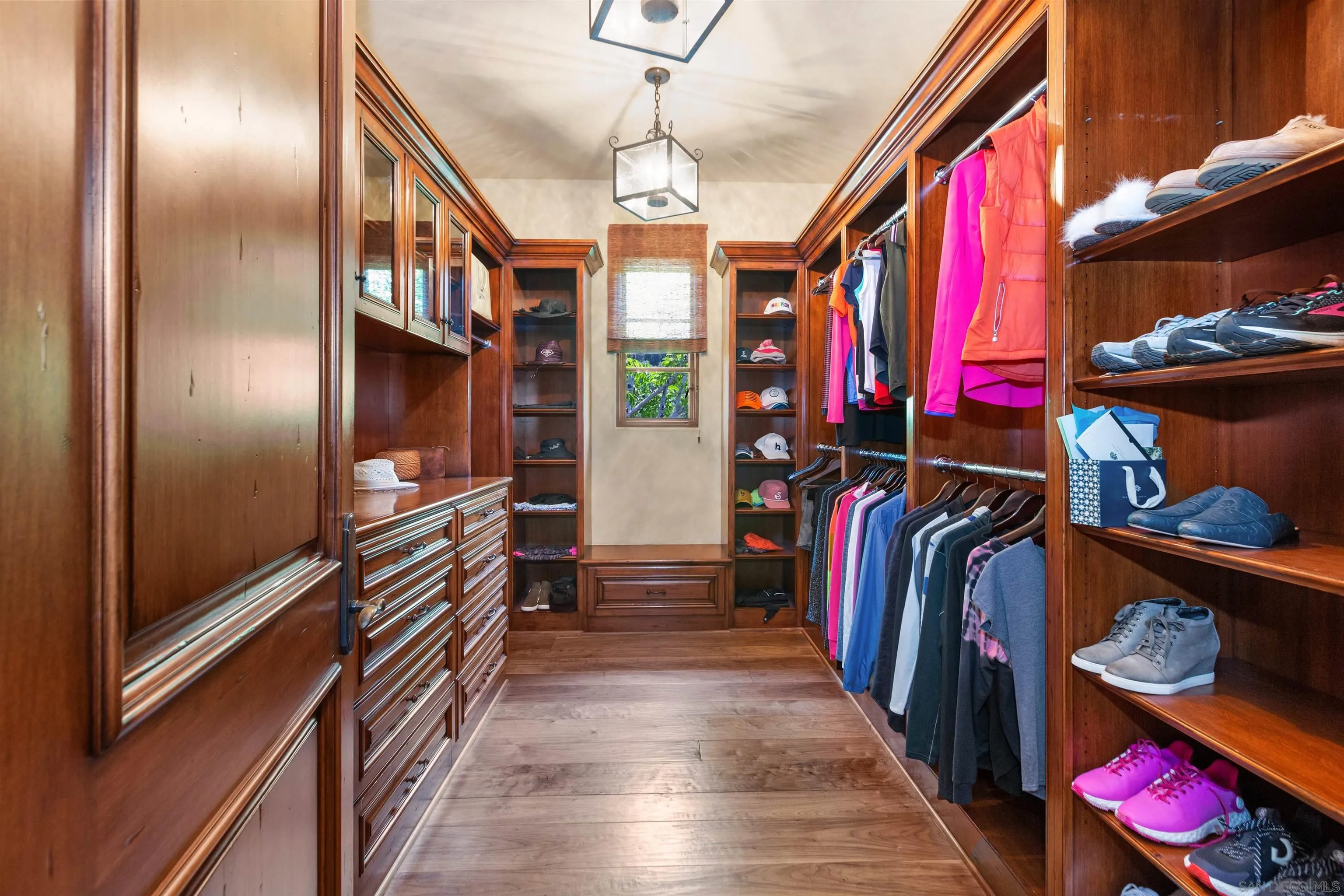 6309 Strada Fragante Rancho Santa Fe, CA 92091 - Photo 26 of 49 a view of walk in closet with clothes and shoes