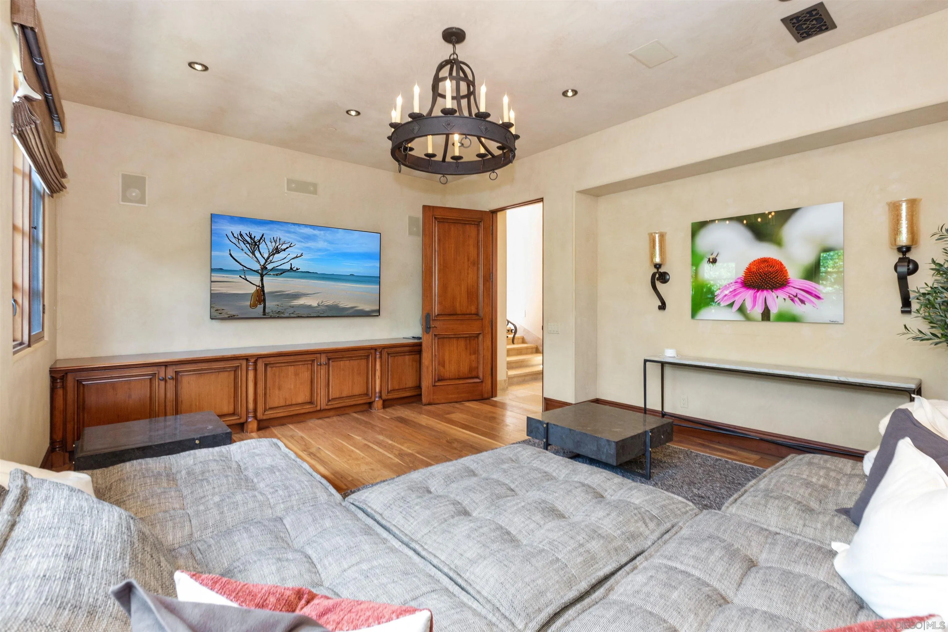 6309 Strada Fragante Rancho Santa Fe, CA 92091 - Photo 29 of 49 a bedroom with a bed and a painting on the wall