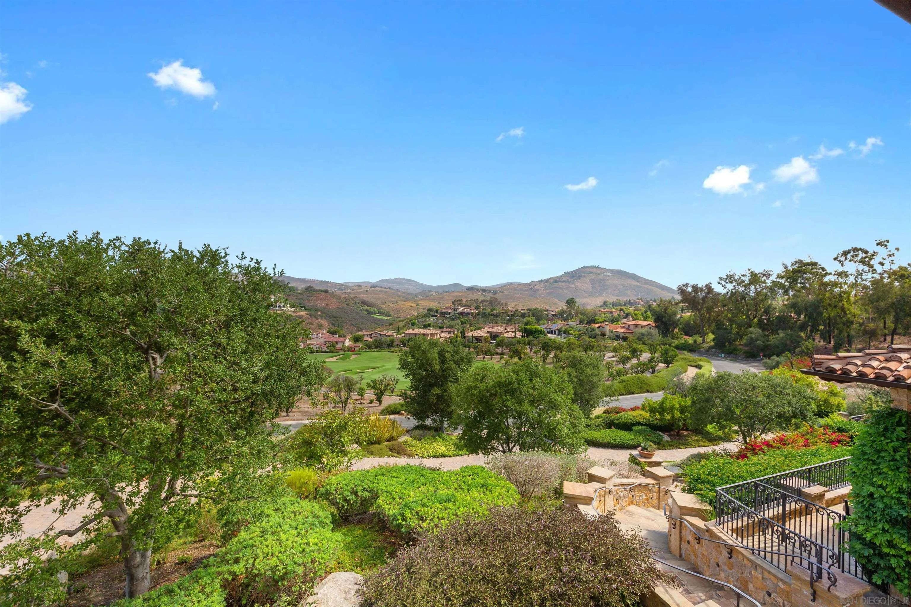 6309 Strada Fragante Rancho Santa Fe, CA 92091 - Photo 3 of 49 a view of a city with lush green forest