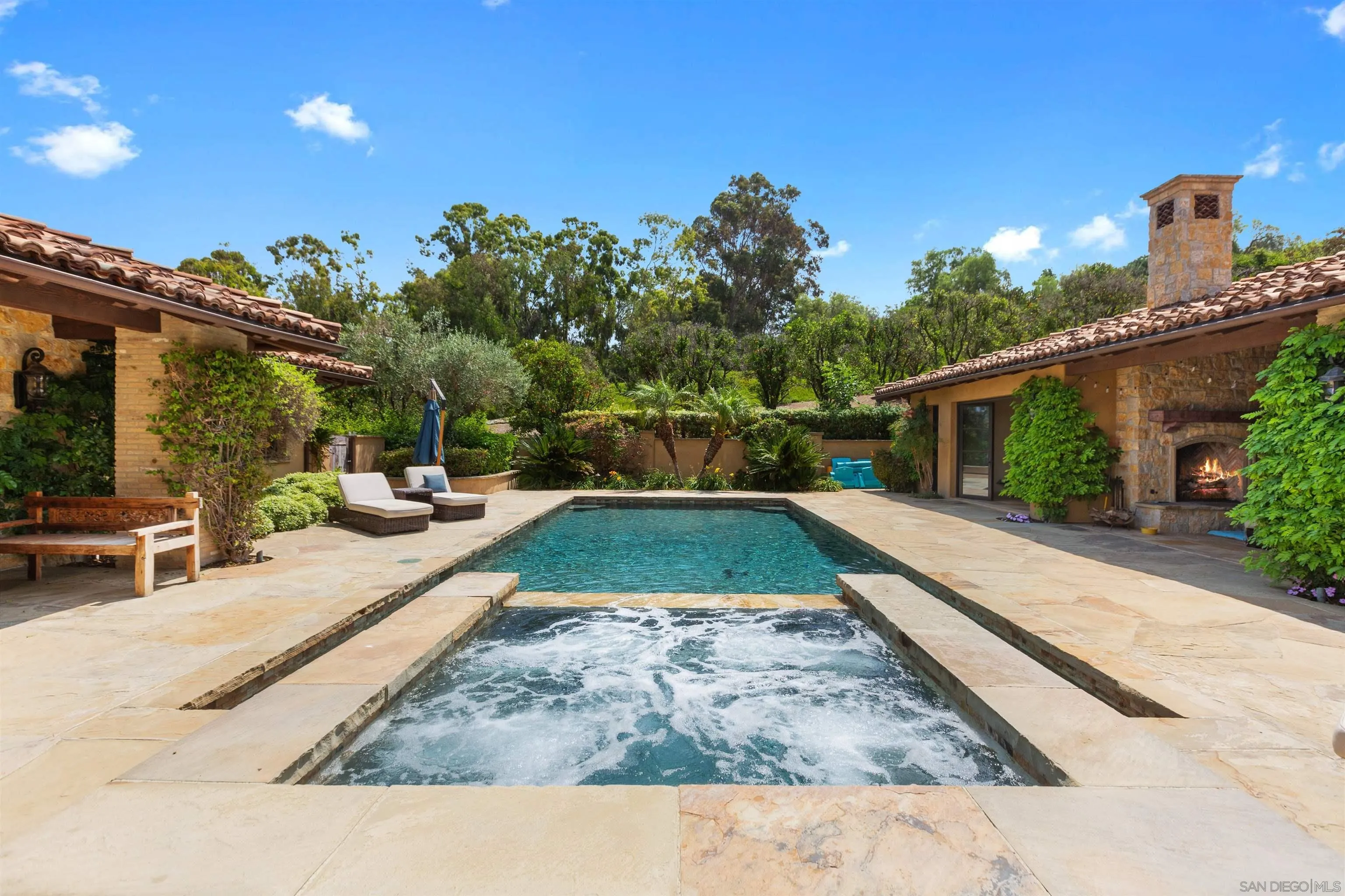 6309 Strada Fragante Rancho Santa Fe, CA 92091 - Photo 34 of 49 a view of a swimming pool with a patio