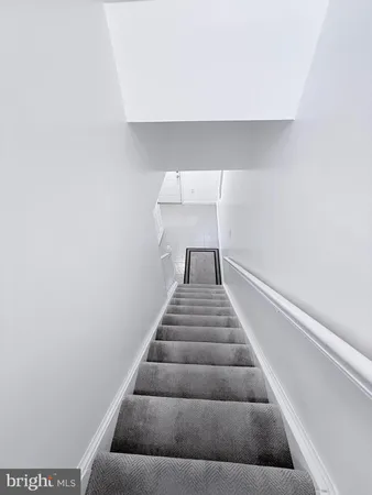 a view of front door with stairs