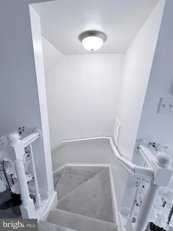 a kitchen with a refrigerator a sink and dishwasher