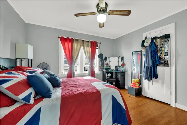 a bed room with a bed and a window