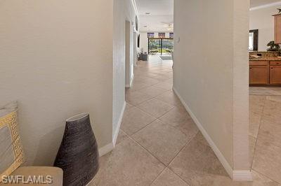 9844 Venezia Circle, Unit 721 Naples, FL 34113 - Photo 19 of 50 a en suite bathroom with a toilet