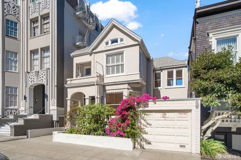 a front view of a multi story residential apartment building