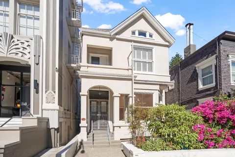 a front view of a multi story residential apartment building