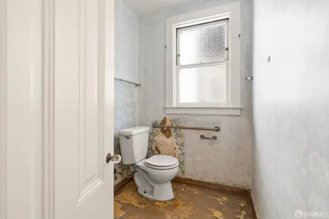 a bathroom with a toilet