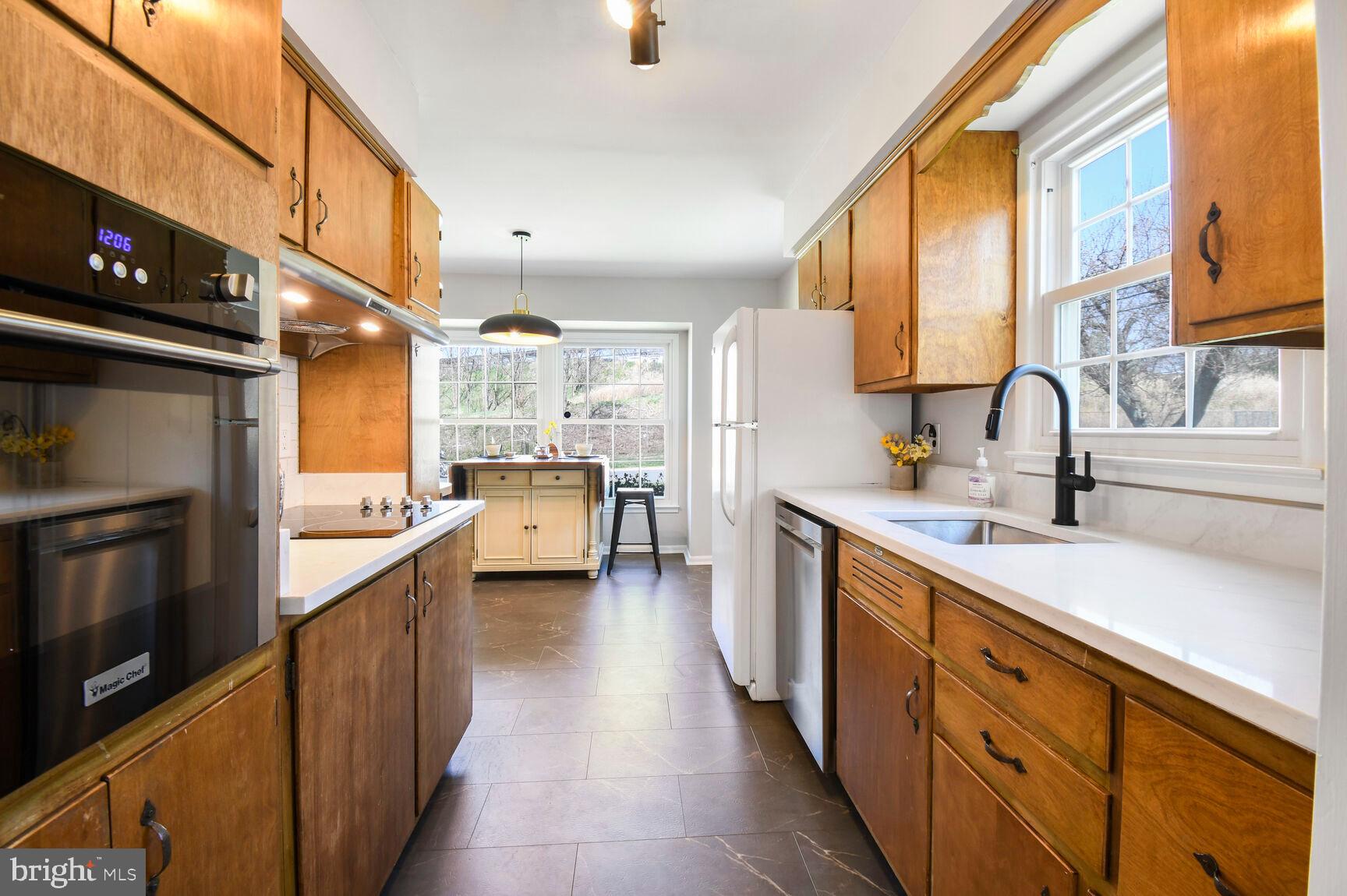 New quartz counters, induction cooktop & wall oven