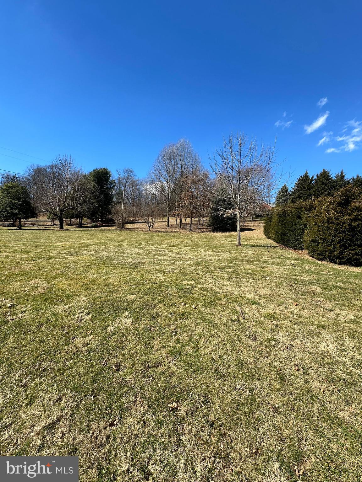 5738 Pigeon Hill Road Spring Grove, PA 17362 - Photo 1 of 7 a swimming pool with an outdoor space and seating area