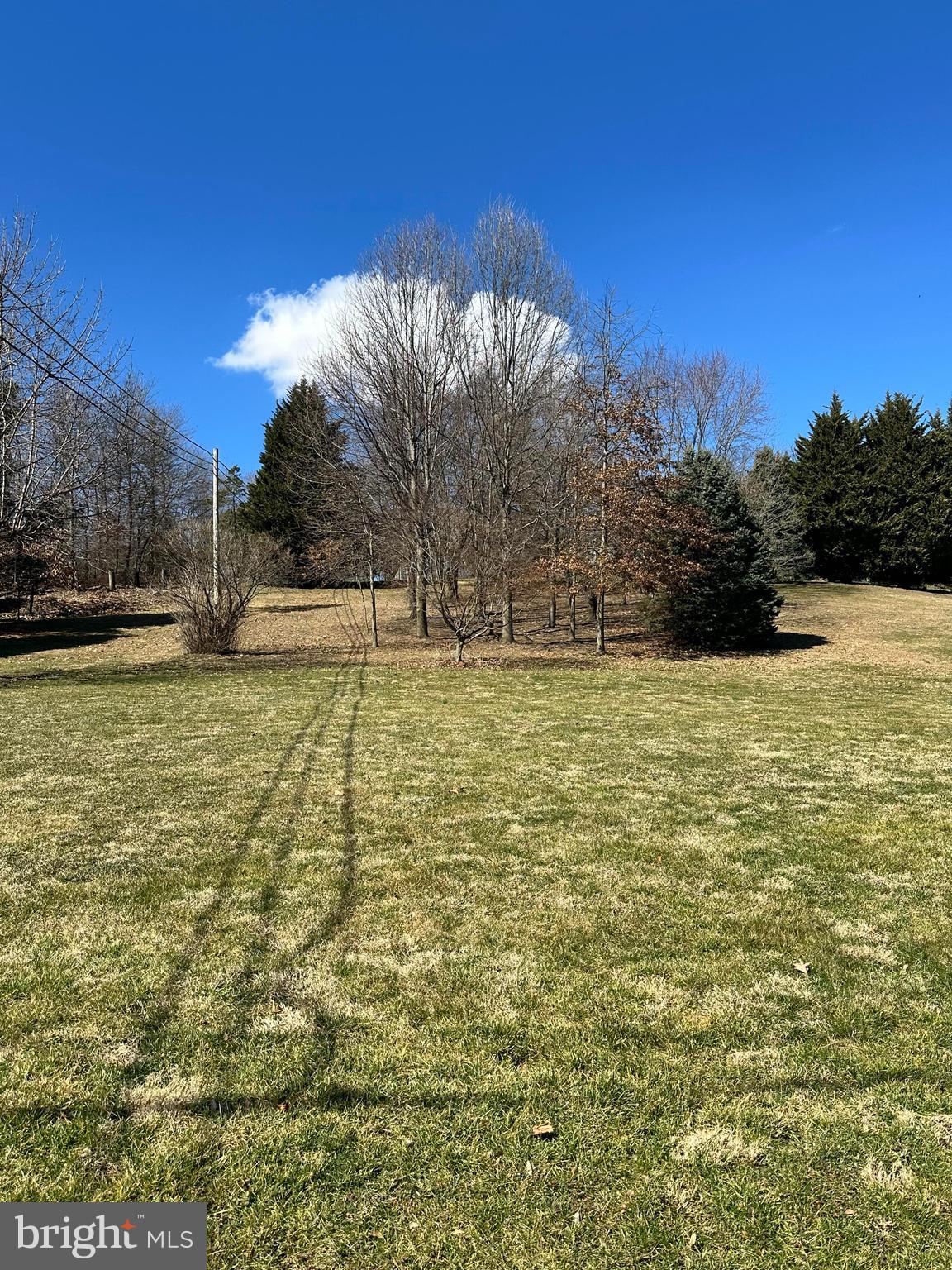 5738 Pigeon Hill Road Spring Grove, PA 17362 - Photo 2 of 7 a swimming pool with an outdoor space and seating area