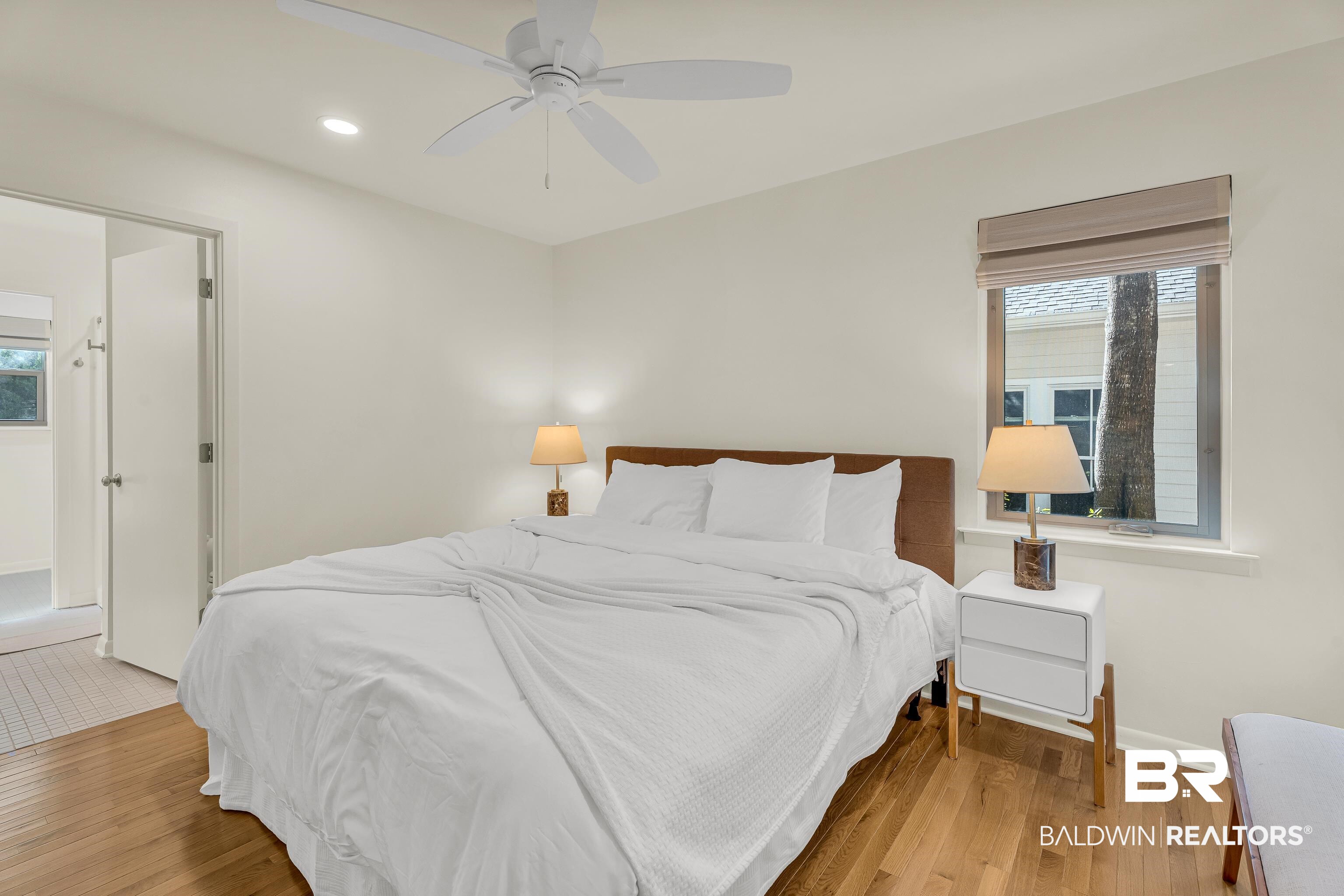 357 Azalea Street Fairhope, AL 36532 - Photo 8 of 22 Bedroom featuring light wood finished floors, recessed lighting, a ceiling fan, and connected bathroom