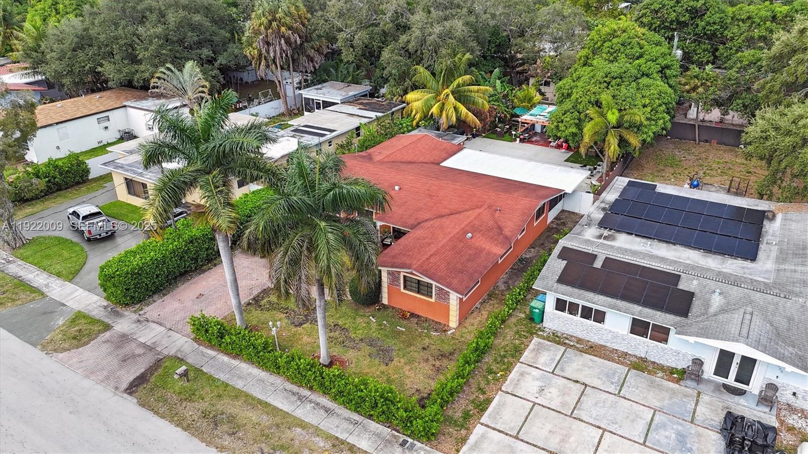 1 No Address North Miami, FL 33161 - Photo 17 of 19 a front view of a house with garden