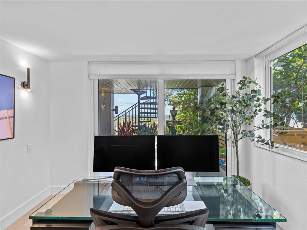 780 Eldorado Avenue Clearwater, FL 33767 - Photo 26 of 98 a room with furniture and a potted plant