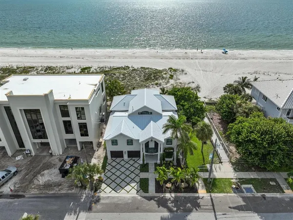 a bathroom with a double vanity sink toilet and shower