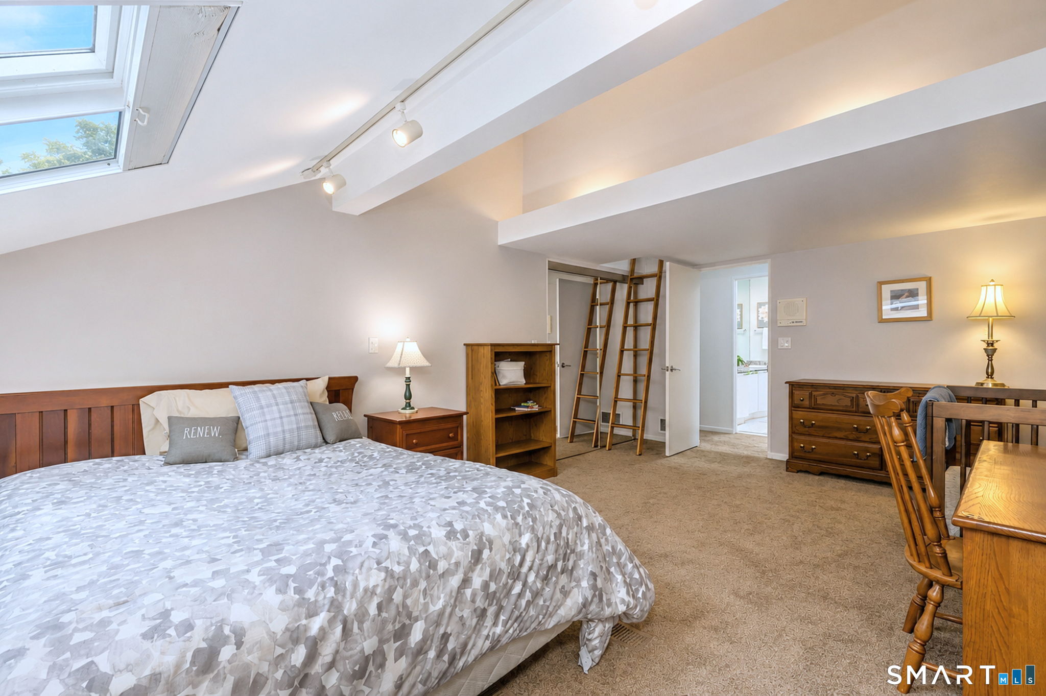 25 Milan Road Woodbridge, CT 06525 - Photo 25 of 40 a bedroom with a large bed and a tv