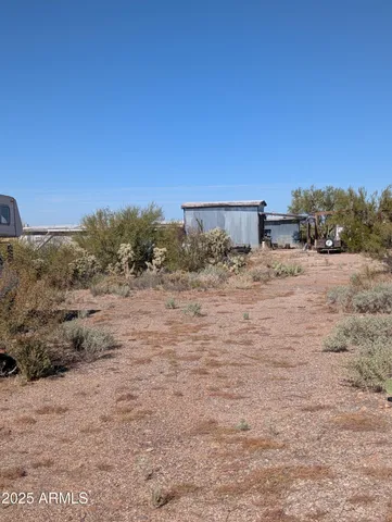 a view of a house with a snow in the yard