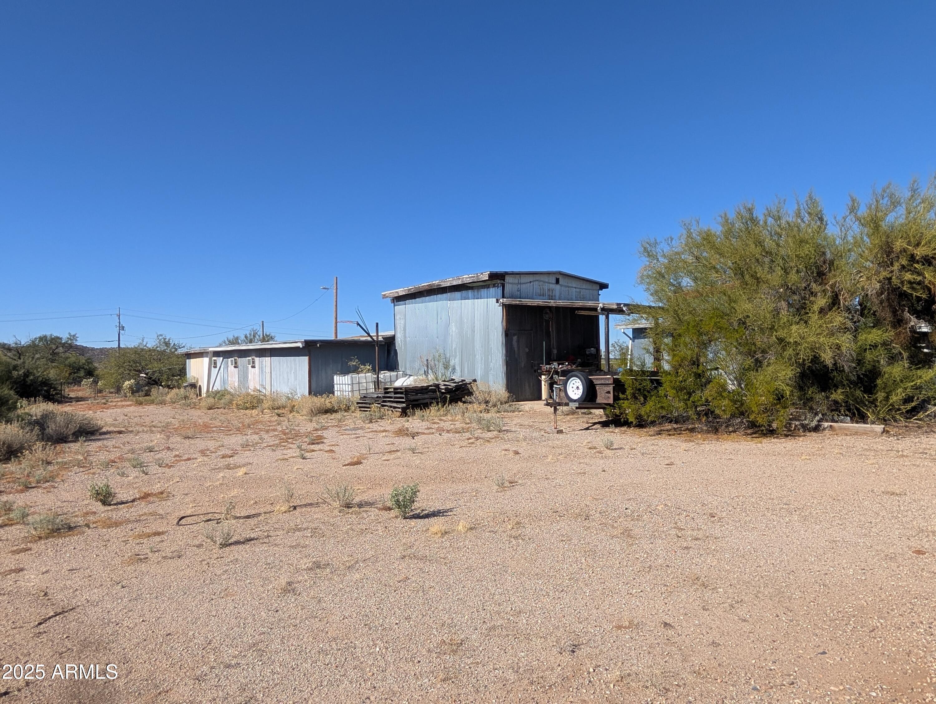 44000 East Fairmont Drive Tucson, AZ 85739 - Photo 26 of 49 a view of a house with a snow in the background