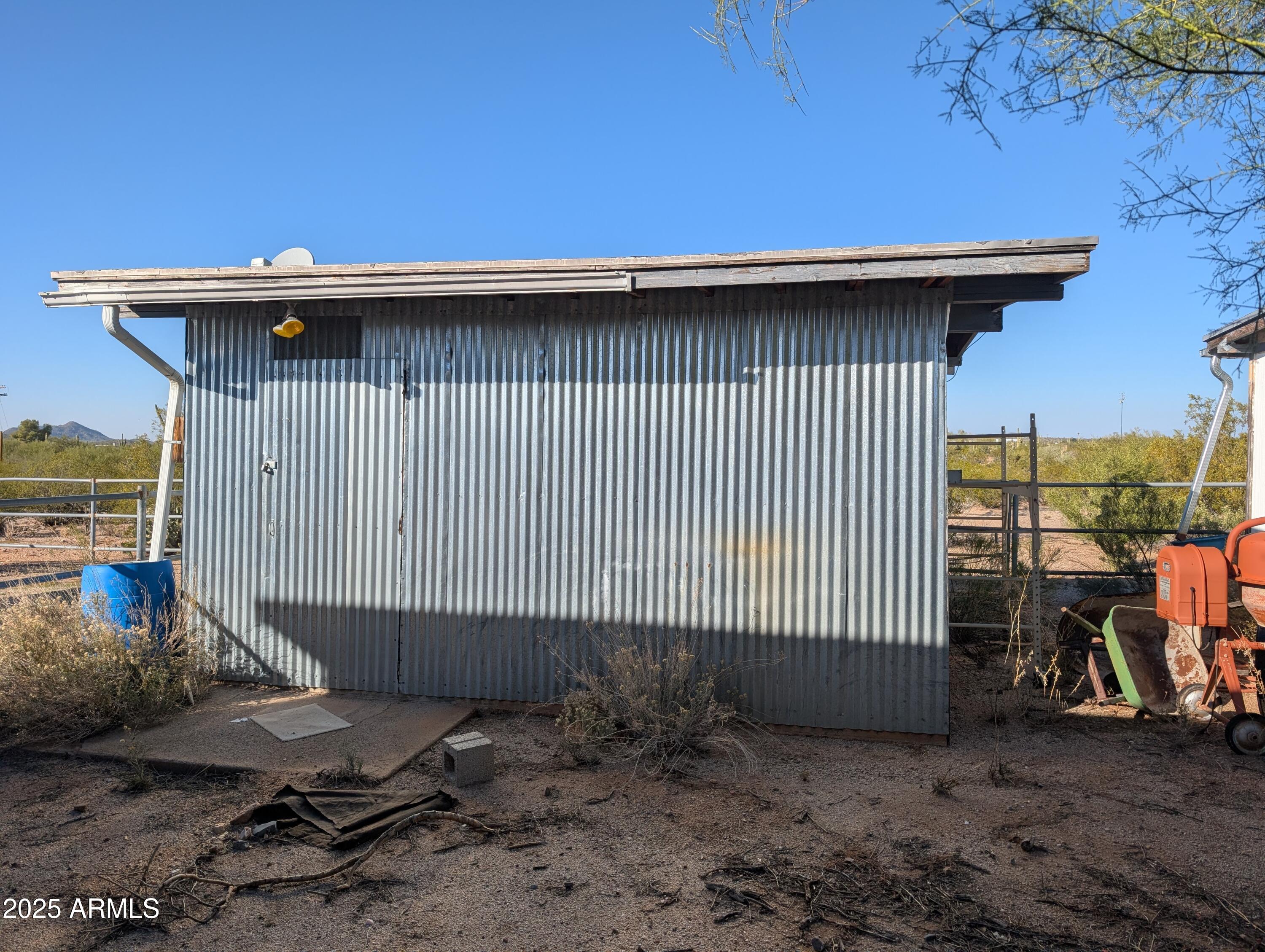 44000 East Fairmont Drive Tucson, AZ 85739 - Photo 33 of 49 a view of a backyard with a chair