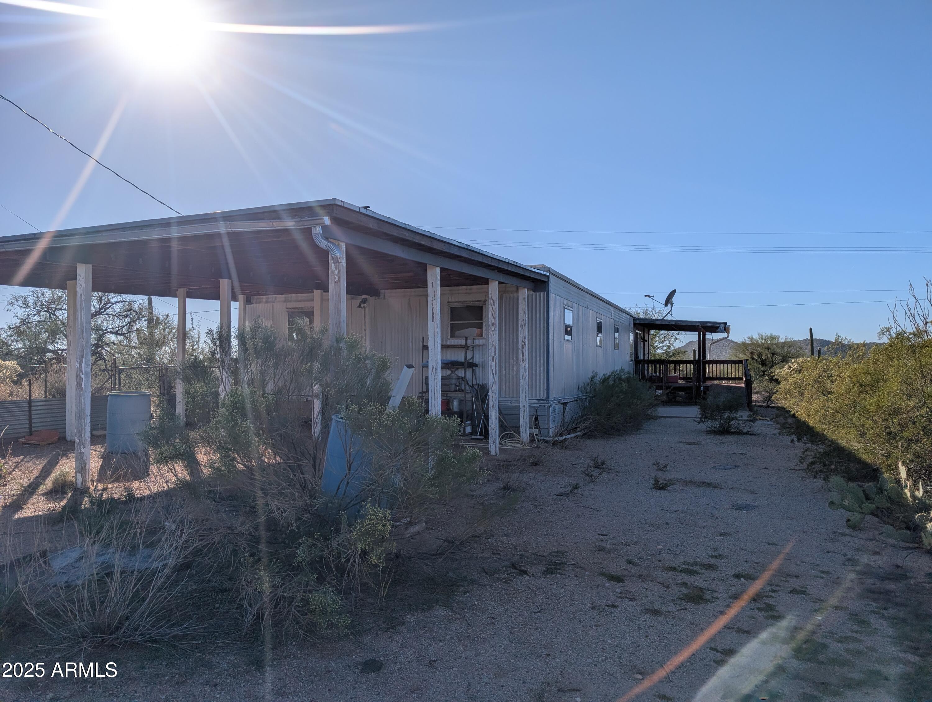 44000 East Fairmont Drive Tucson, AZ 85739 - Photo 8 of 49 a view of a small house