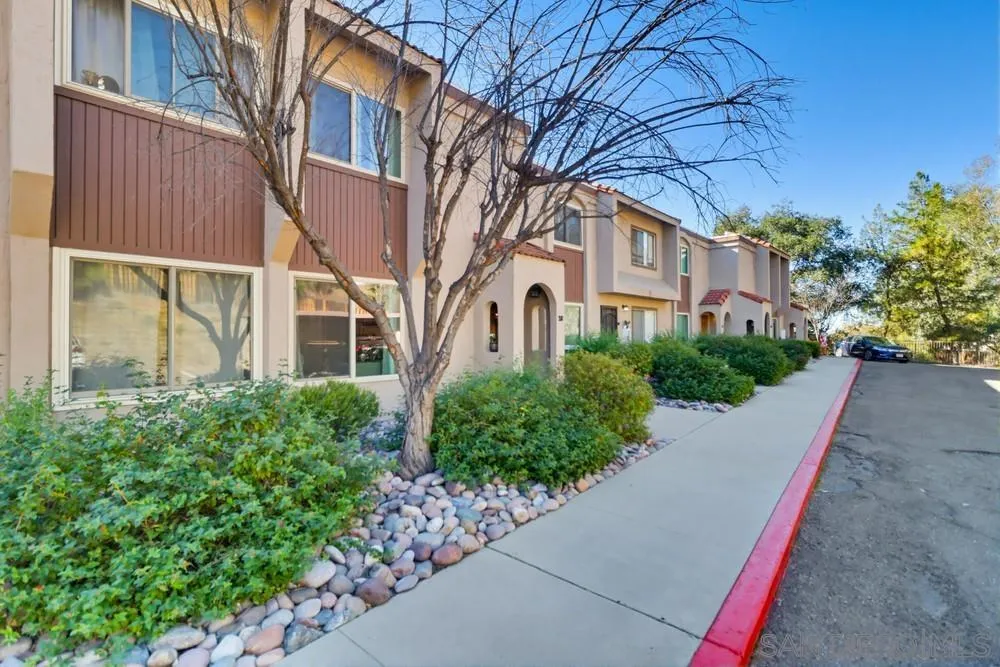 2616 Alpine Boulevard, Unit 28 Alpine, CA 91901 - Photo 27 of 34 a view of a building with a yard