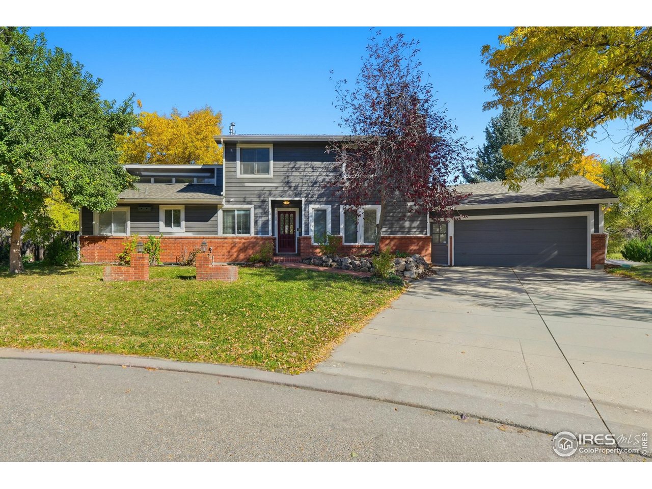 Located on a quiet cul-de-sac with a big backyard and trails right out your door.