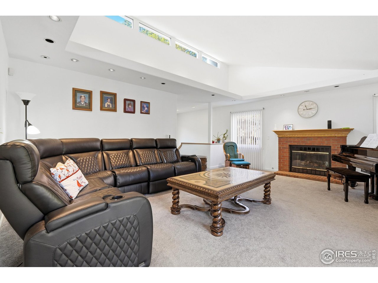 4584 Robinson Place Boulder, CO 80301 - Photo 11 of 34 The great room with vaulted ceilings has another fireplace to enjoy.