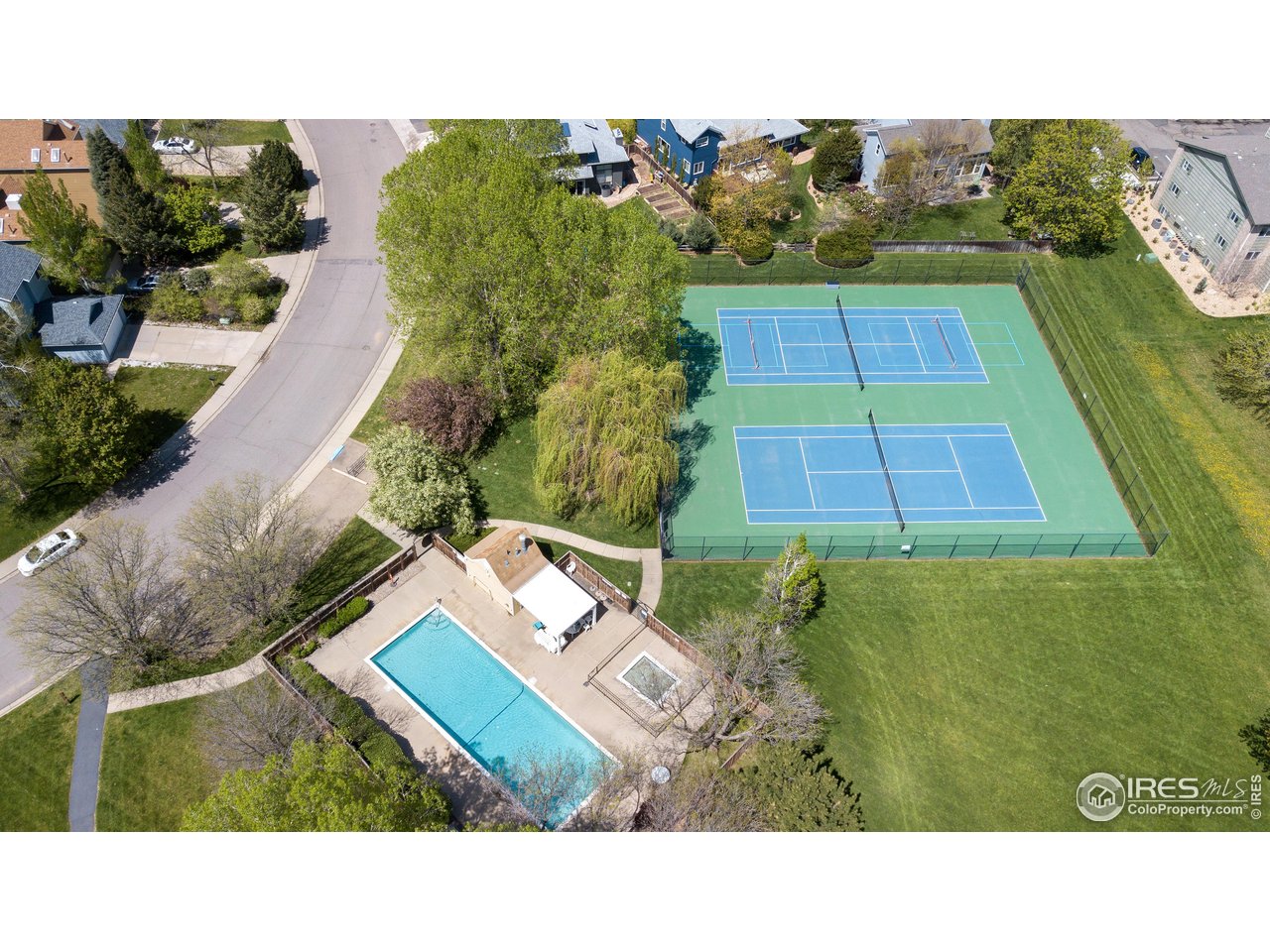 4584 Robinson Place Boulder, CO 80301 - Photo 33 of 34 HOA pool, tennis/pickelball courts, and park in the summer