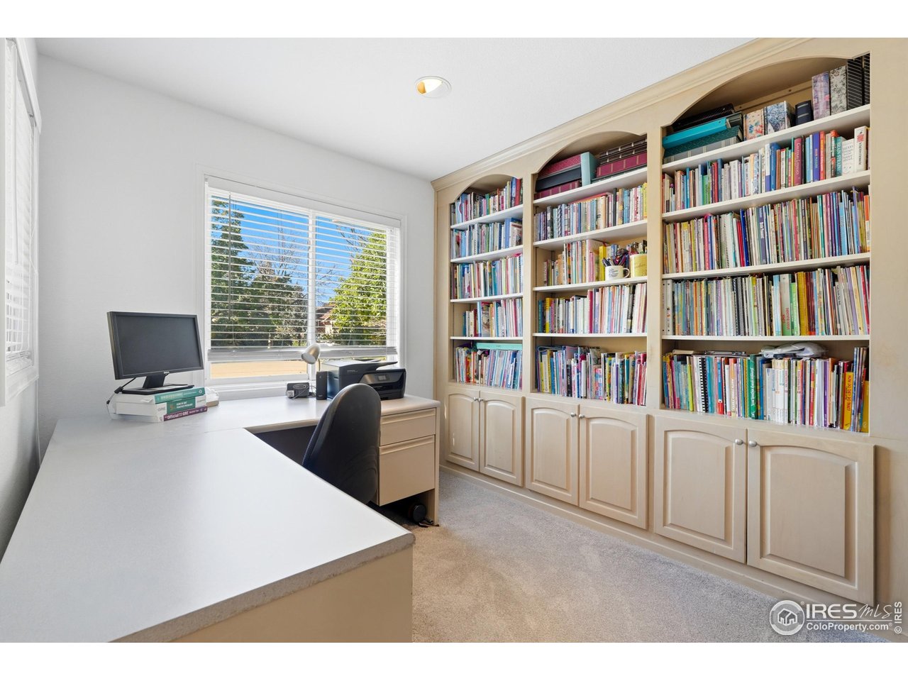4584 Robinson Place Boulder, CO 80301 - Photo 9 of 34 Home office with built-in bookcases.