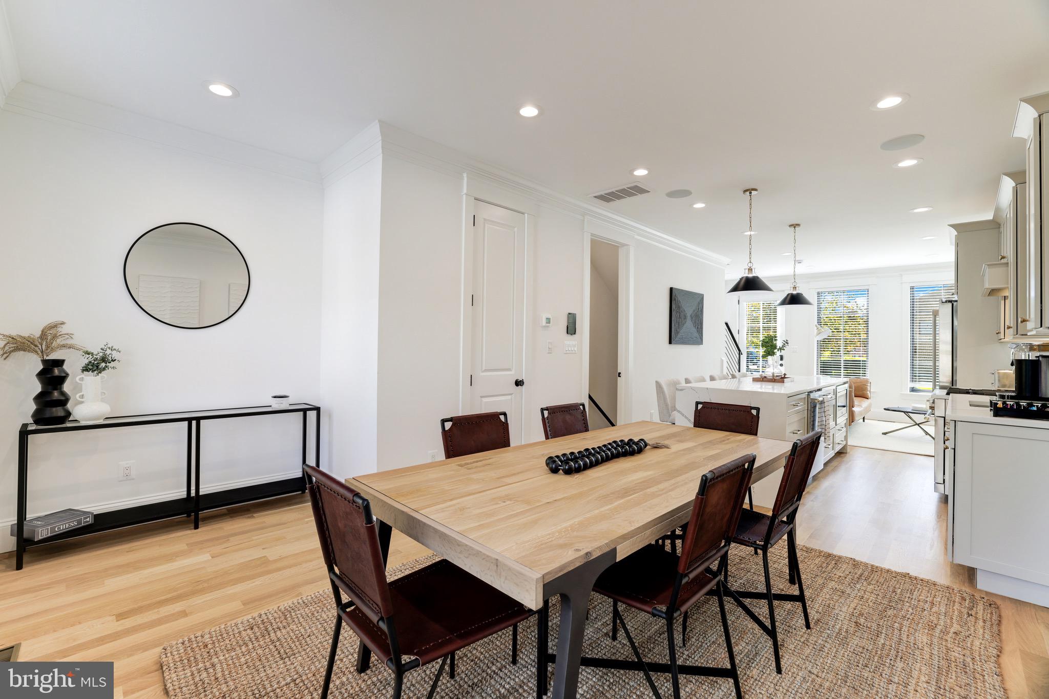 1415 Princess Street Alexandria, VA 22314 - Photo 26 of 63 a view of a dining room with furniture and wooden floor