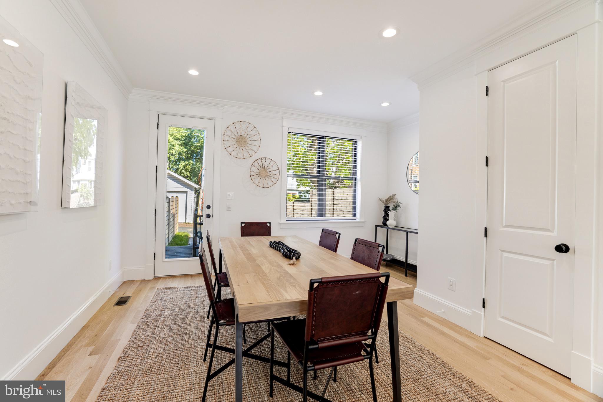 1415 Princess Street Alexandria, VA 22314 - Photo 27 of 63 a view of a dining room with furniture and wooden floor