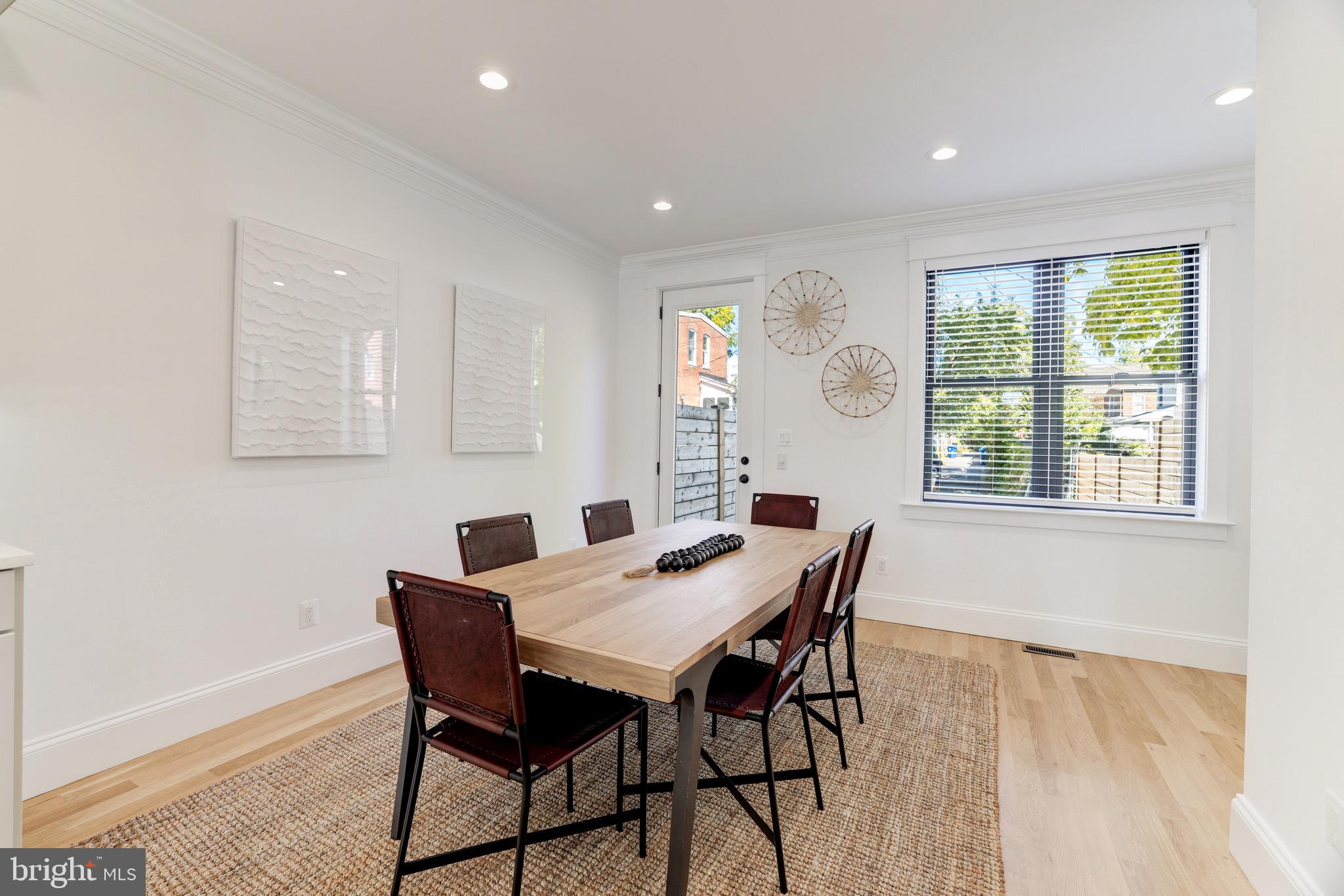 1415 Princess Street Alexandria, VA 22314 - Photo 28 of 63 a view of a dining room with furniture and wooden floor