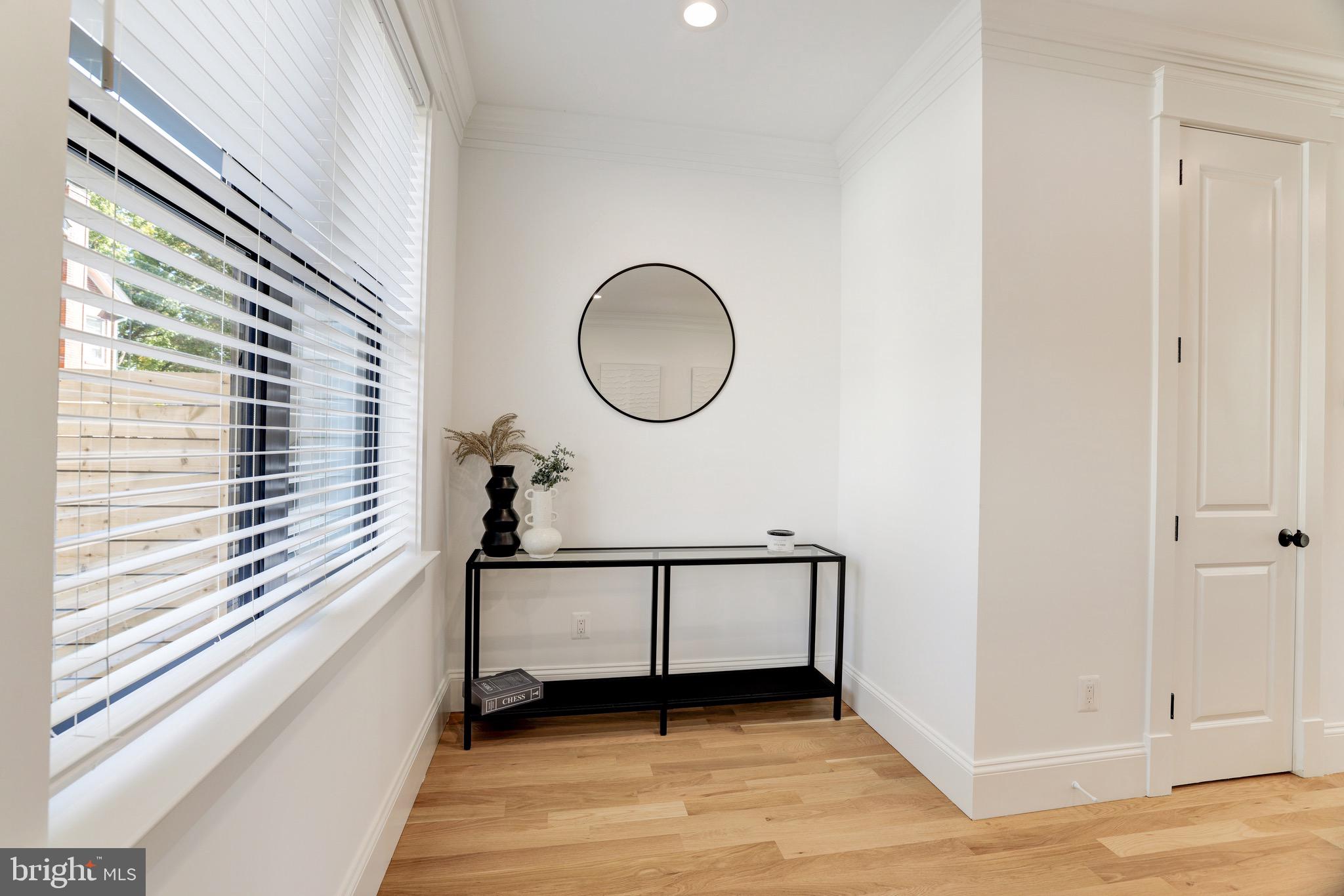1415 Princess Street Alexandria, VA 22314 - Photo 30 of 63 a view of a room with wooden floor and windows