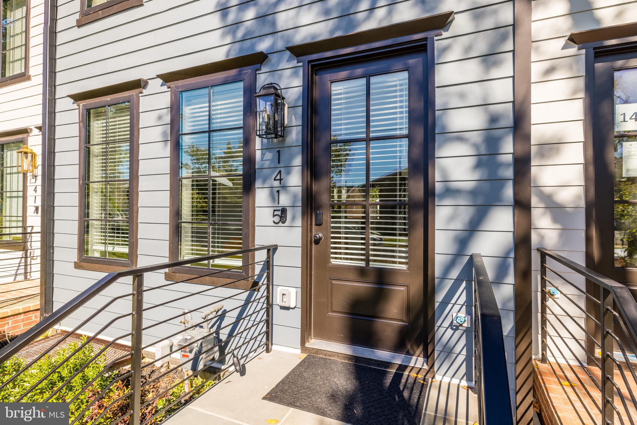 1415 Princess Street Alexandria, VA 22314 - Photo 3 of 63 a view of balcony and floor to ceiling window and wooden floor