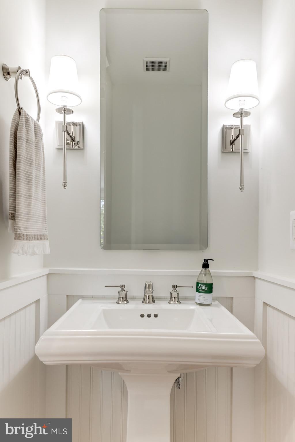 1415 Princess Street Alexandria, VA 22314 - Photo 35 of 63 a bathroom with a sink and a mirror