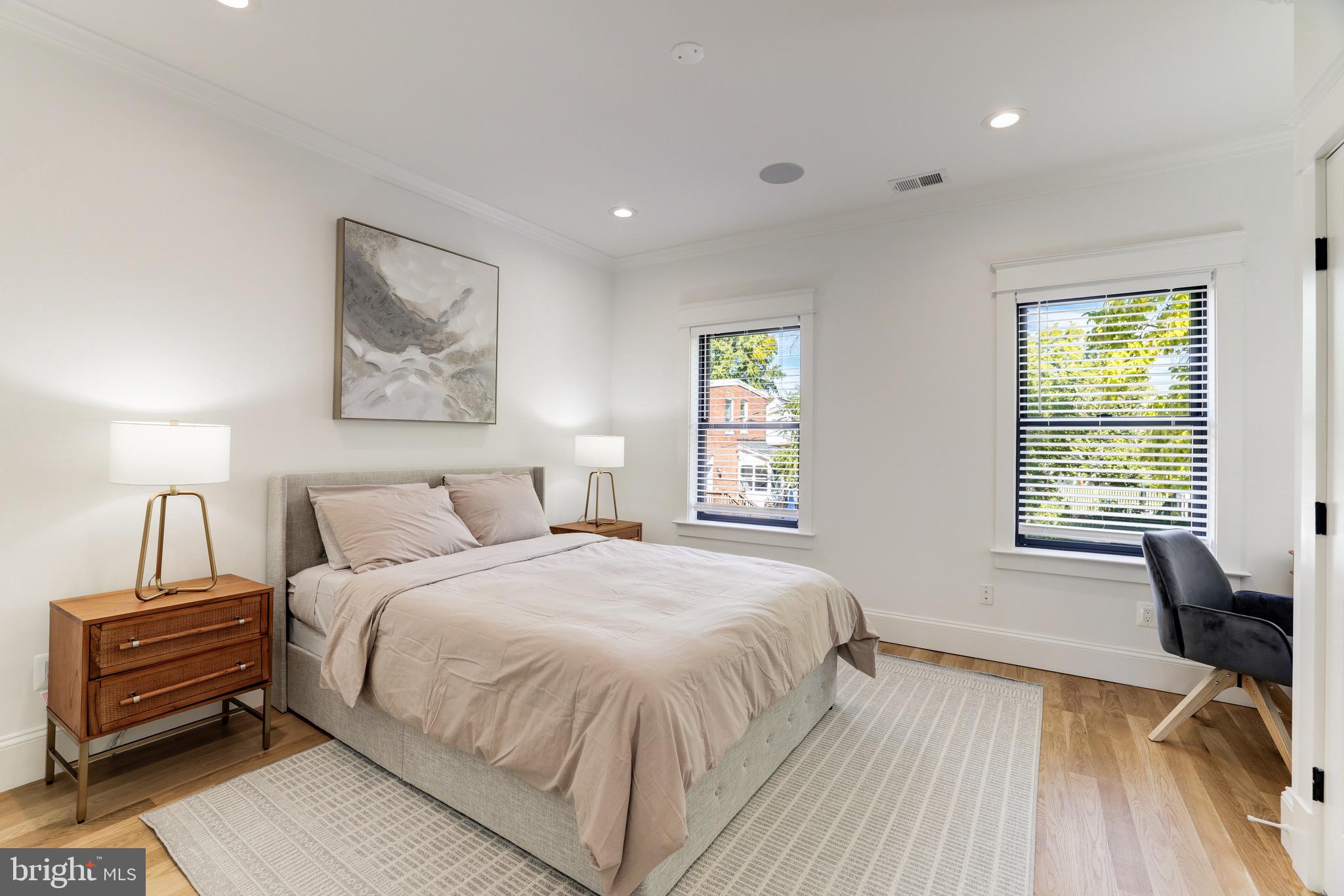 1415 Princess Street Alexandria, VA 22314 - Photo 42 of 63 a bedroom with a bed and a desk