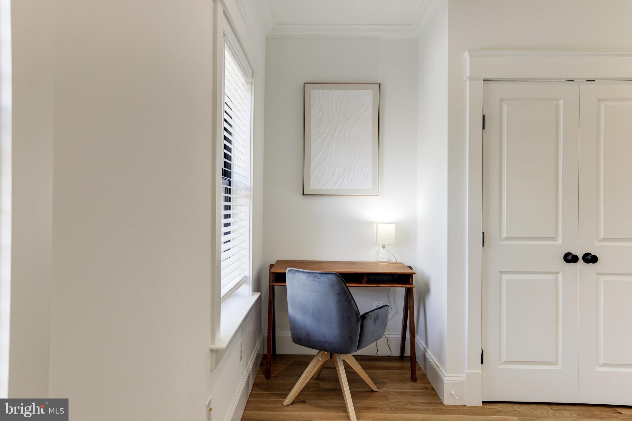 1415 Princess Street Alexandria, VA 22314 - Photo 46 of 63 a view of a room with a chair and wooden floor