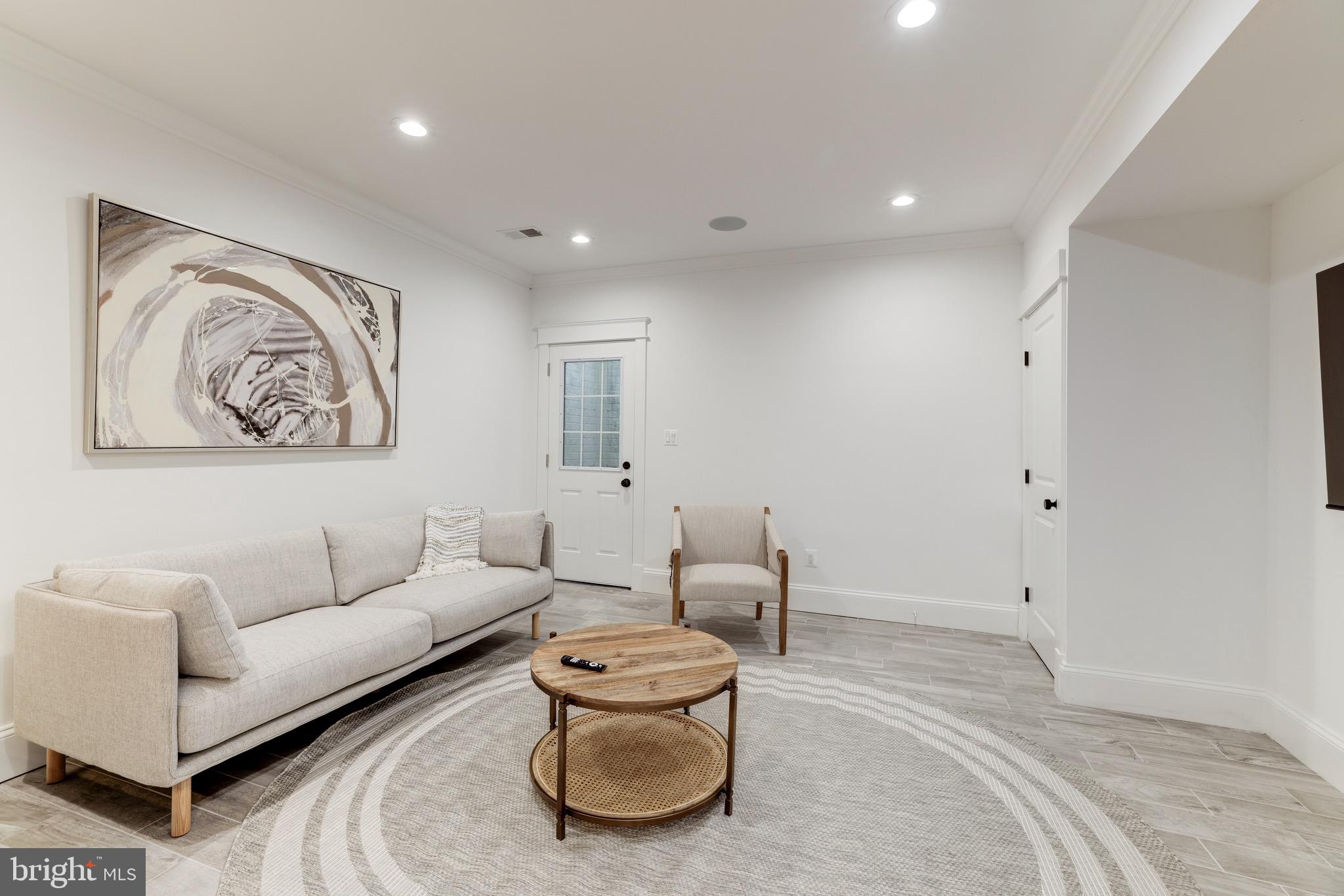 1415 Princess Street Alexandria, VA 22314 - Photo 53 of 63 a living room with furniture and a large window