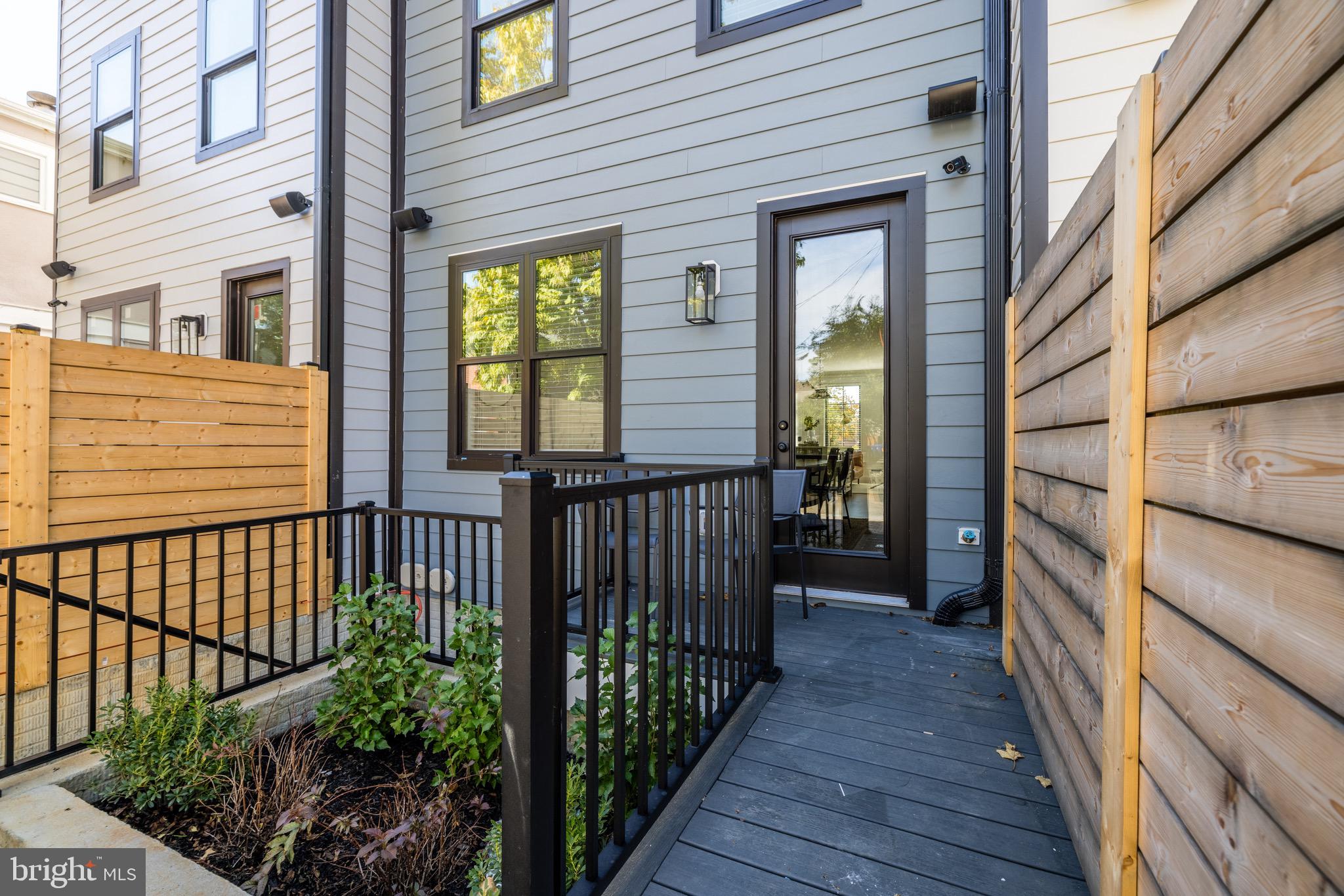 1415 Princess Street Alexandria, VA 22314 - Photo 60 of 63 a view of a balcony with wooden floor